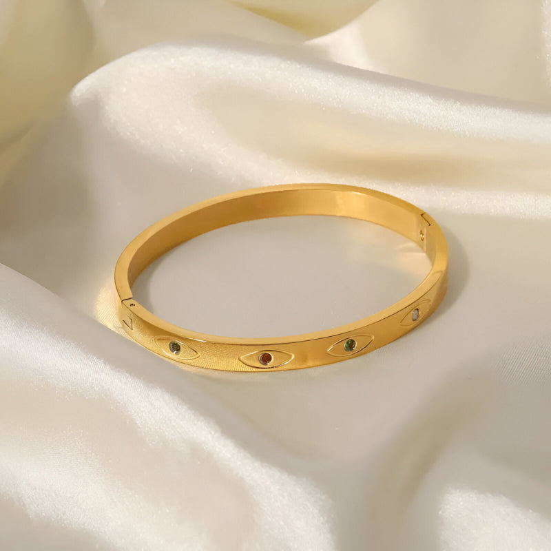 Pulsera de acero inoxidable con circonitas redondas de colores y oro de 18 quilates