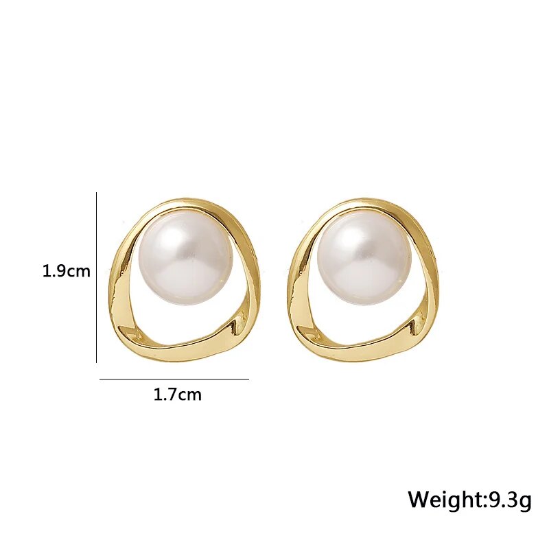 Pendientes de perla simulada de color dorado
