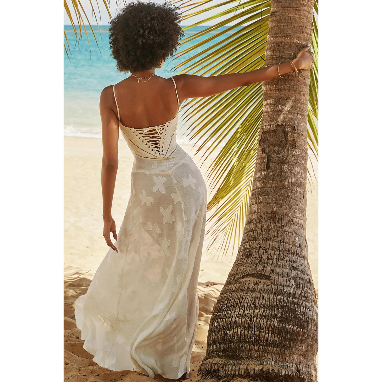 Elegante vestido midi con corsé en color beige con jacquard floral y espalda con cordones