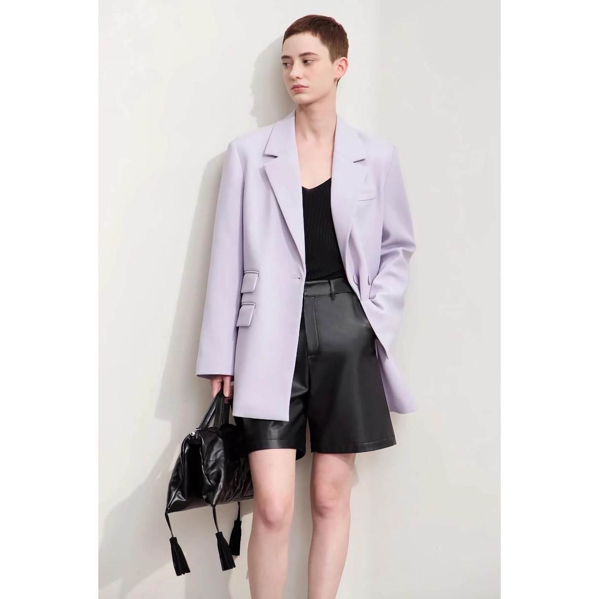 Elegante blazer cruzado de otoño con cuello con muescas