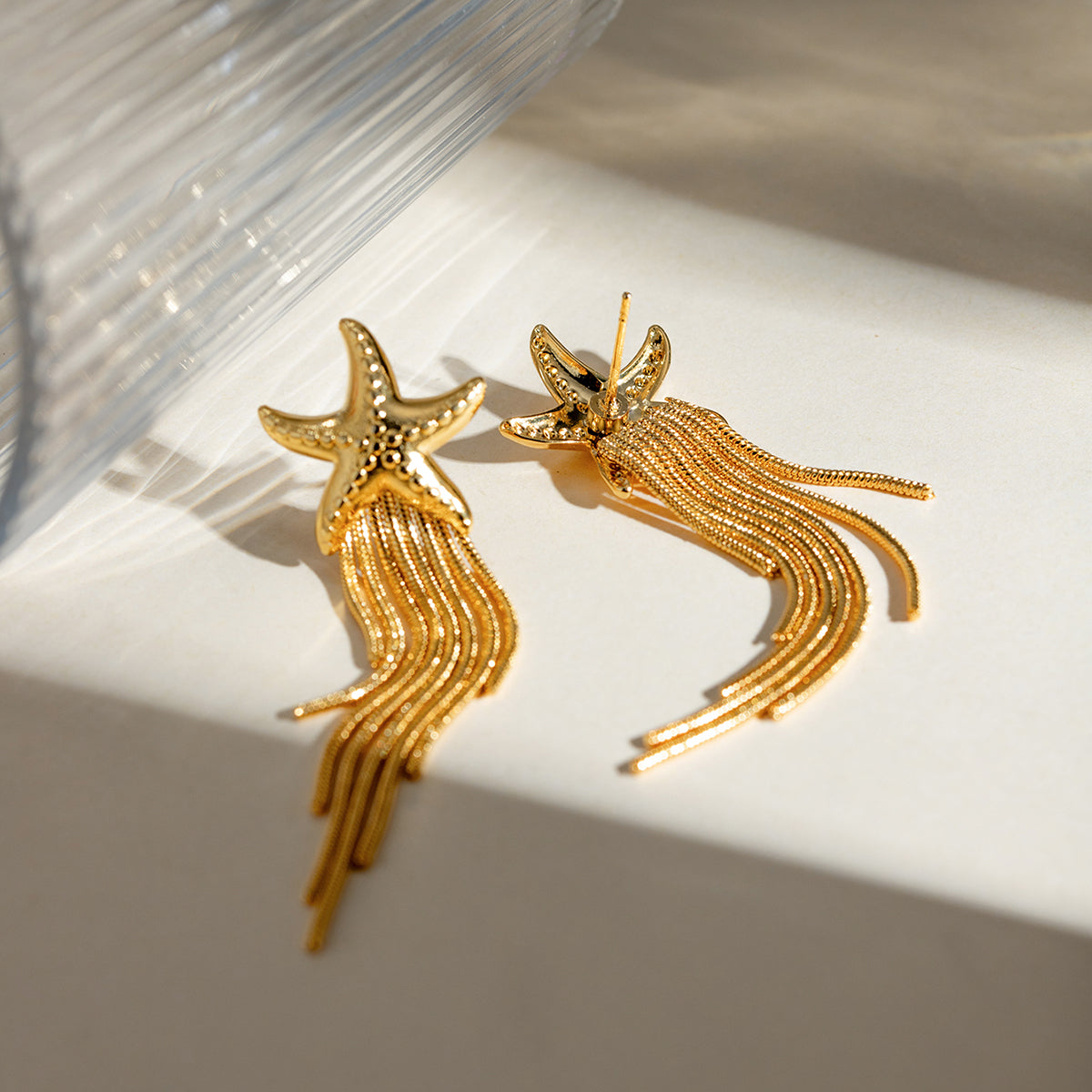 Ohrhänger aus 18 Karat vergoldetem Edelstahl mit Seestern-Quaste