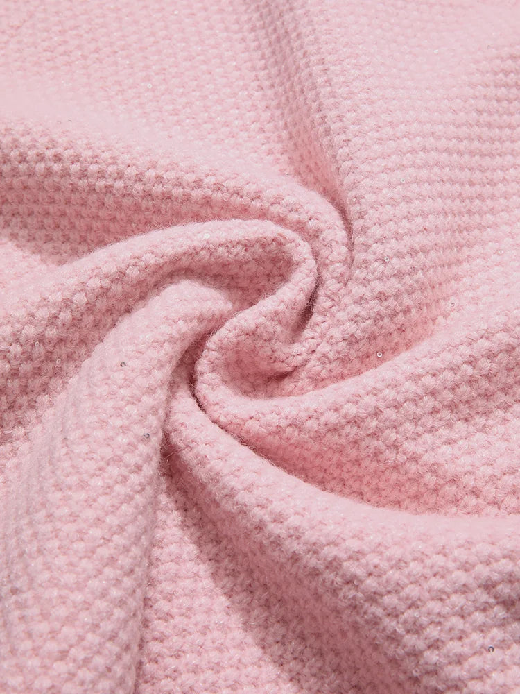 Stilvolles Set aus rosa Tweed-Strickjacke und Shorts