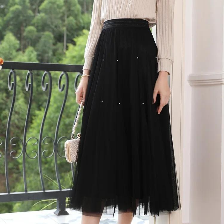Falda elegante de malla de talle alto en forma de A