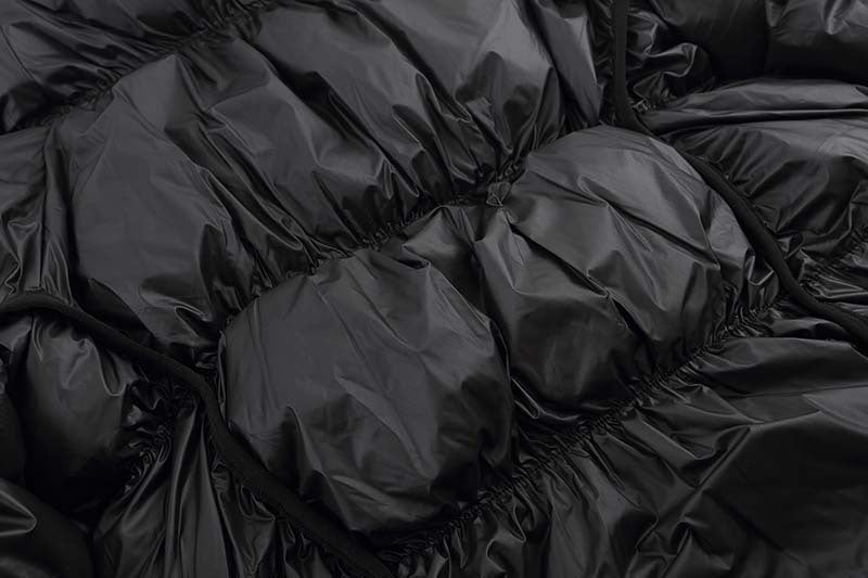 Herrenjacke mit Baumwollpolsterung und kurzem Vorderteil und langem Rückenteil der Marke Tide