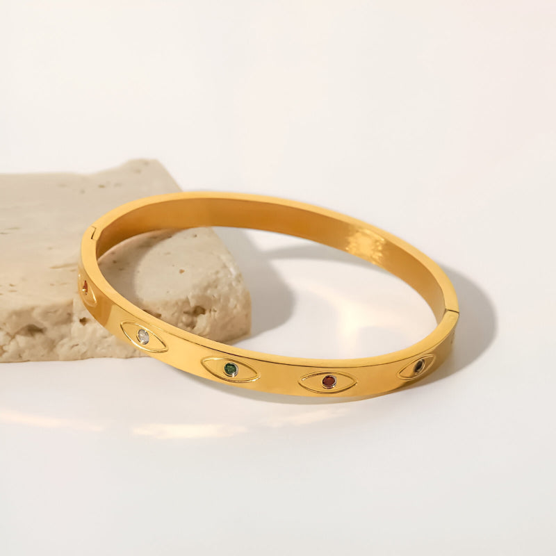 Pulsera de acero inoxidable con circonitas redondas de colores y oro de 18 quilates