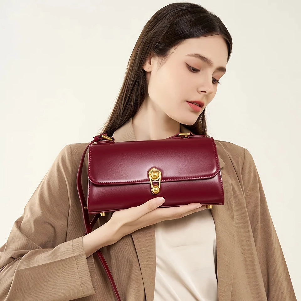 Elegante bolso bandolera de piel color burdeos para mujer