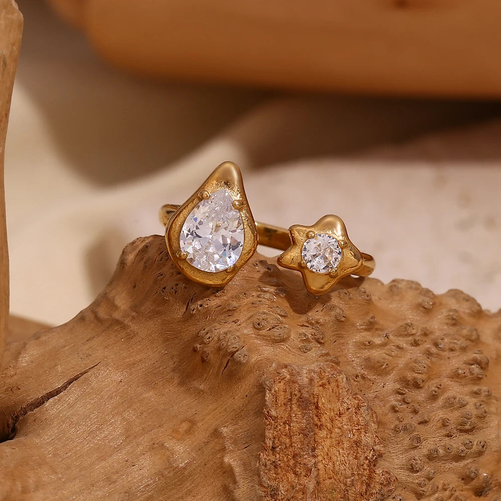 Anillo de estrella con gotas de agua asimétricas, acero inoxidable con circonitas bañado en oro de 18 quilates