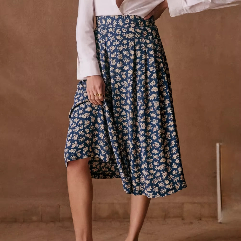 Eleganter Midirock mit hoher Taille und Schlitz im Blumendruck