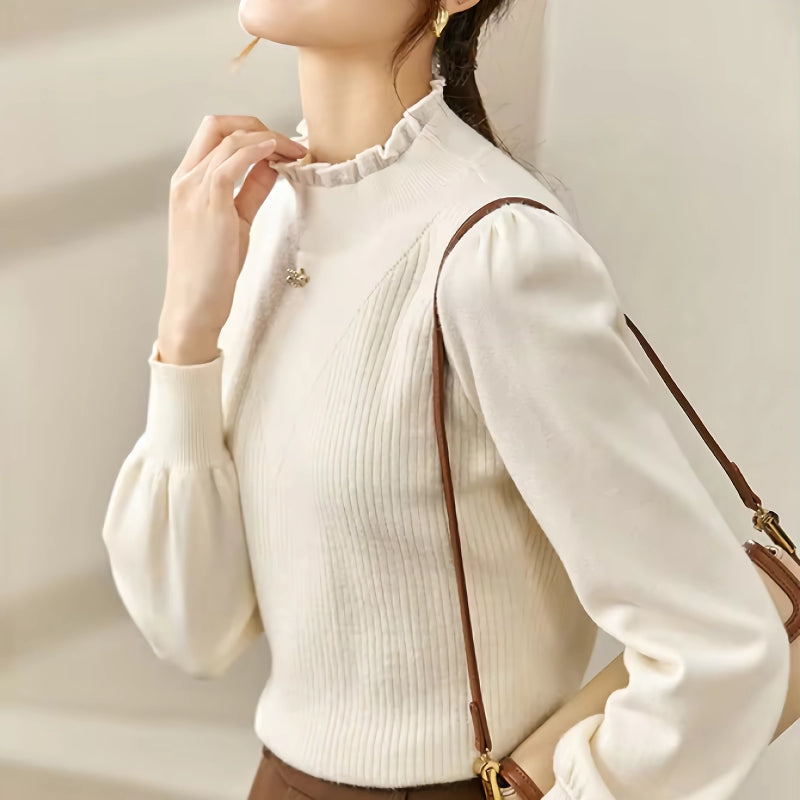 Eleganter Strickpullover mit Puffärmeln und Love-Brosche