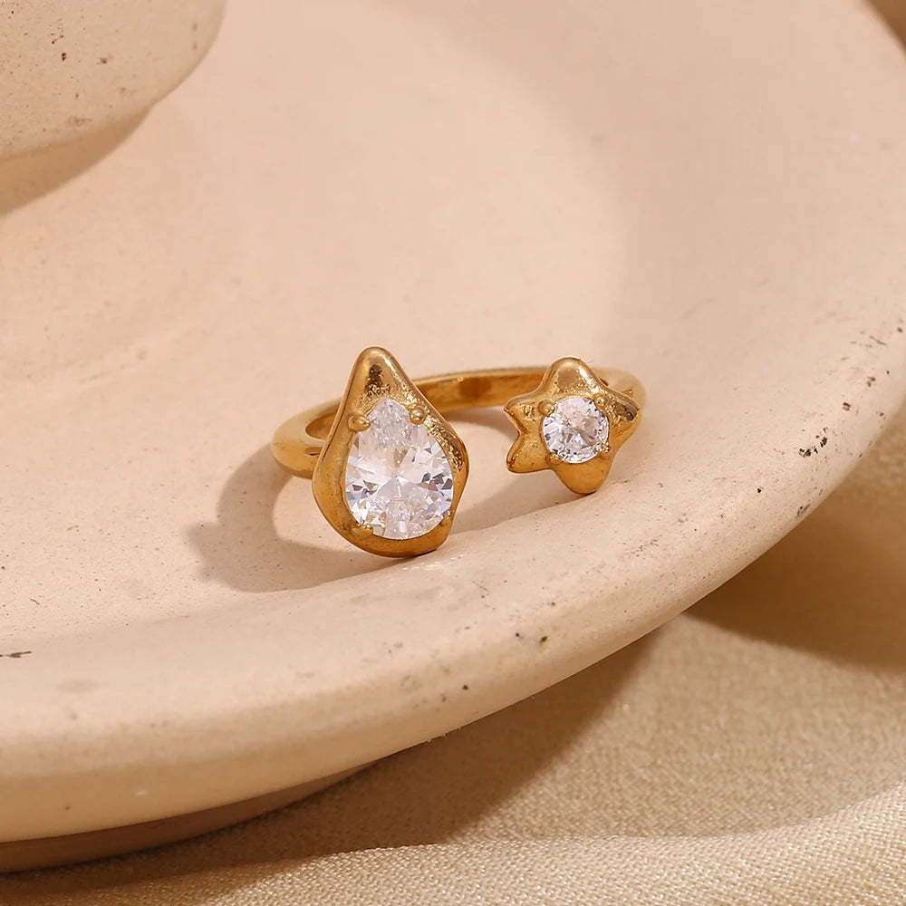 Anillo de estrella con gotas de agua asimétricas, acero inoxidable con circonitas bañado en oro de 18 quilates