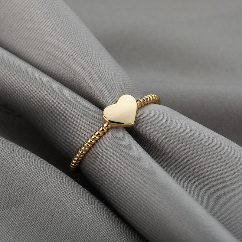 Herzförmiger Liebesring aus Edelstahl und Kupfer - Eleganter Hochzeits- und Modeschmuck für Damen