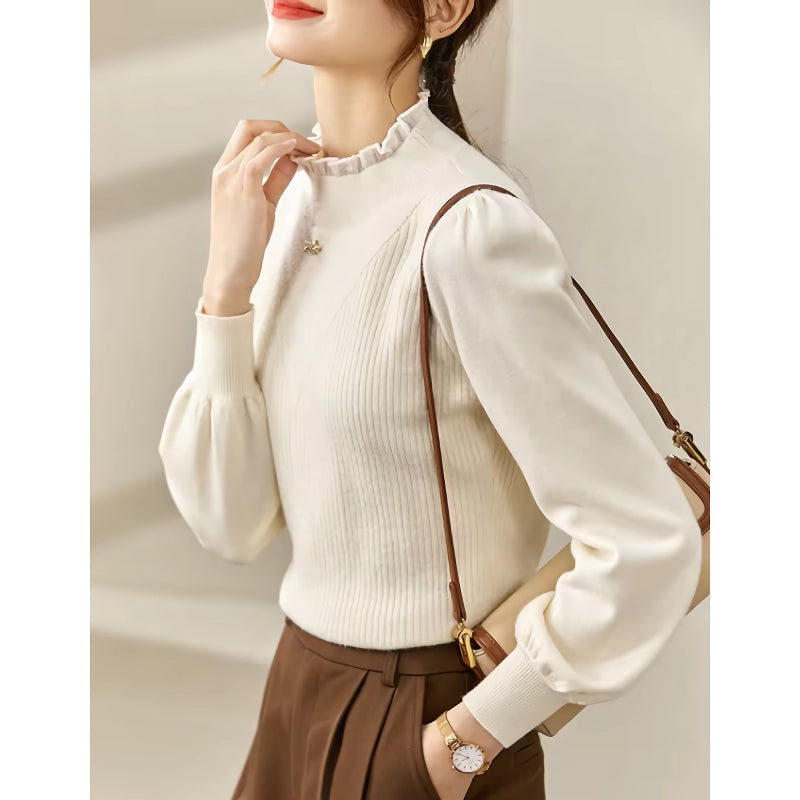 Eleganter Strickpullover mit Puffärmeln und Love-Brosche