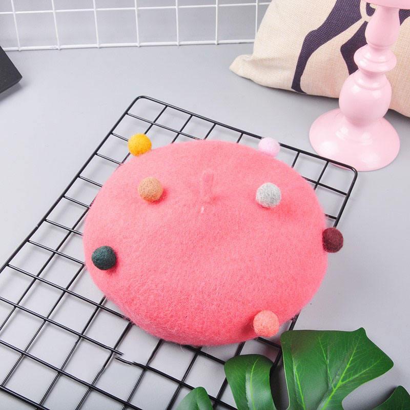Boina infantil de 4 colores con pompón