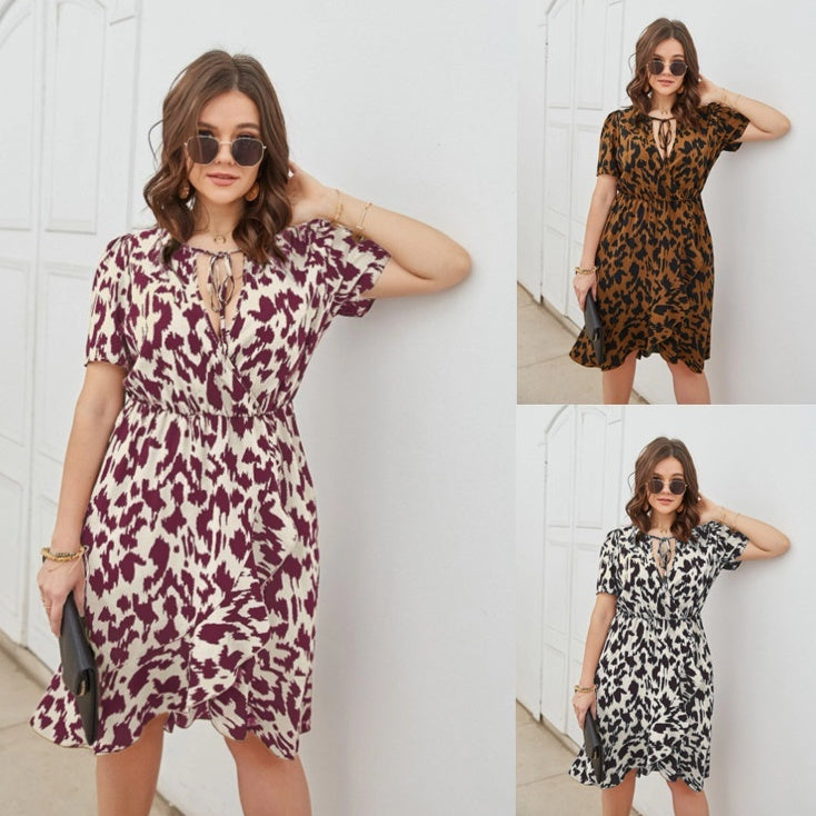 Vestido estampado con escote en V y manga corta de moda informal