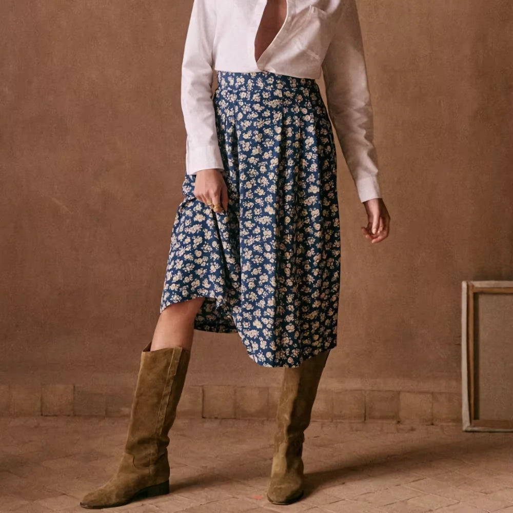 Eleganter Midirock mit hoher Taille und Schlitz im Blumendruck