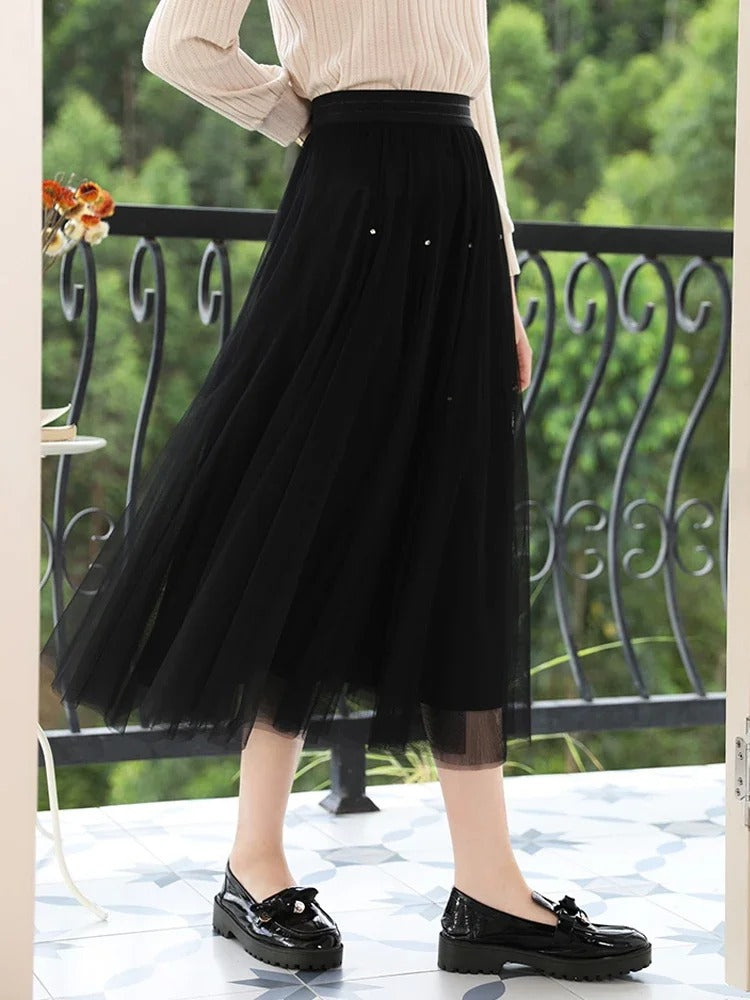 Falda elegante de malla de talle alto en forma de A