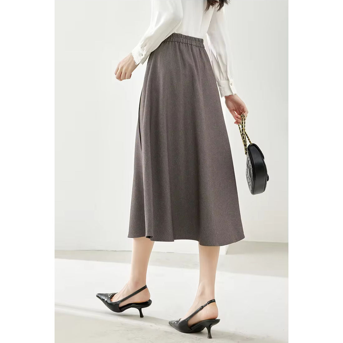 Falda midi elegante de cuadros color café para mujer