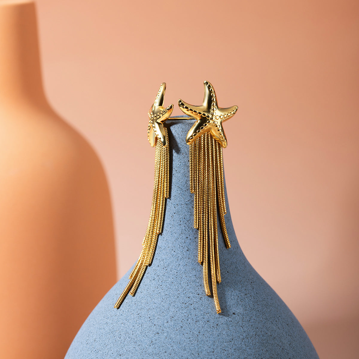 Ohrhänger aus 18 Karat vergoldetem Edelstahl mit Seestern-Quaste