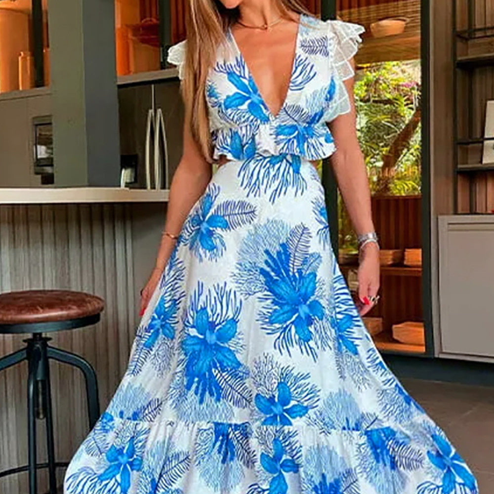 Vestido con escote en V profundo, espalda descubierta y abertura en el abdomen con estampado azul