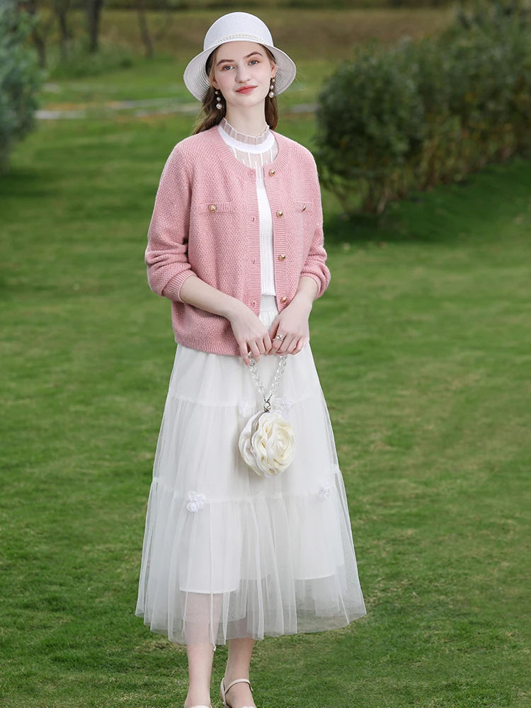 Stilvolles Set aus rosa Tweed-Strickjacke und Shorts