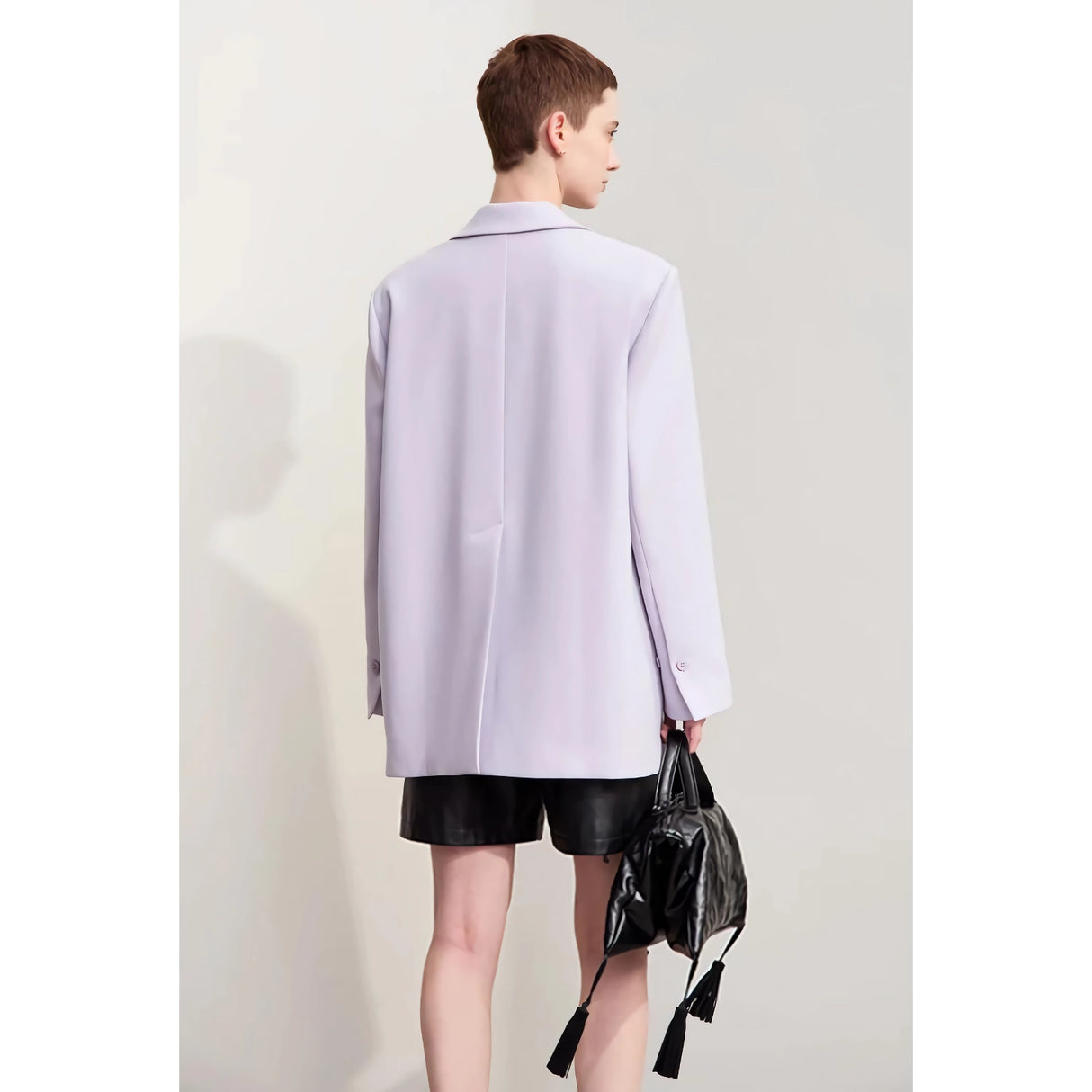 Elegante blazer cruzado de otoño con cuello con muescas