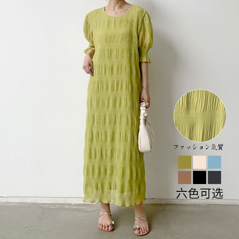 Vestido de mujer con textura plisada, suave y elegante