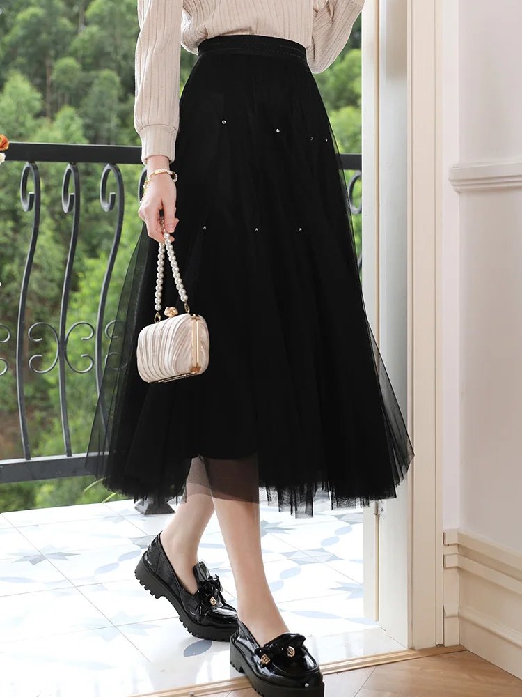 Falda elegante de malla de talle alto en forma de A