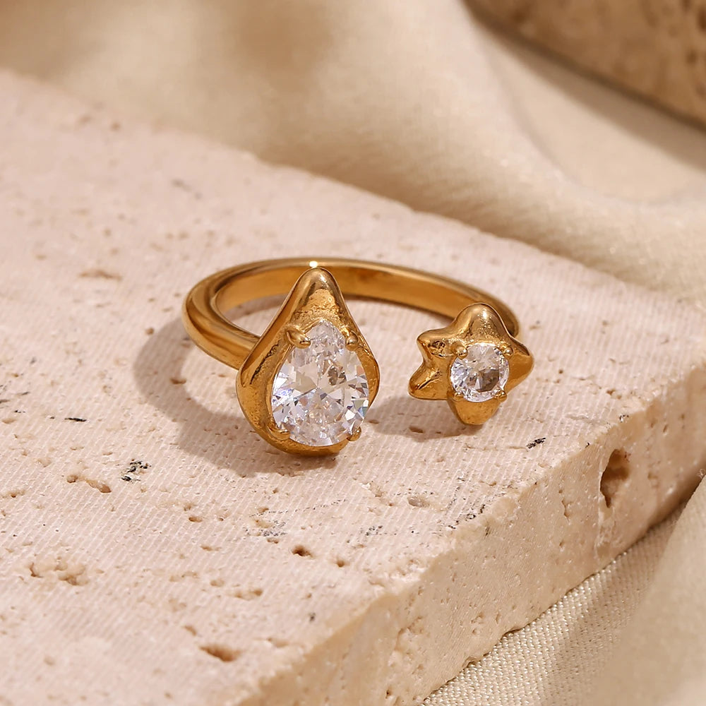 Anillo de estrella con gotas de agua asimétricas, acero inoxidable con circonitas bañado en oro de 18 quilates