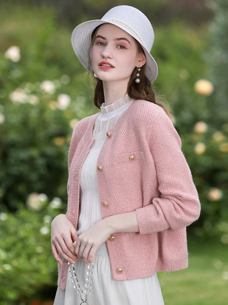 Stilvolles Set aus rosa Tweed-Strickjacke und Shorts