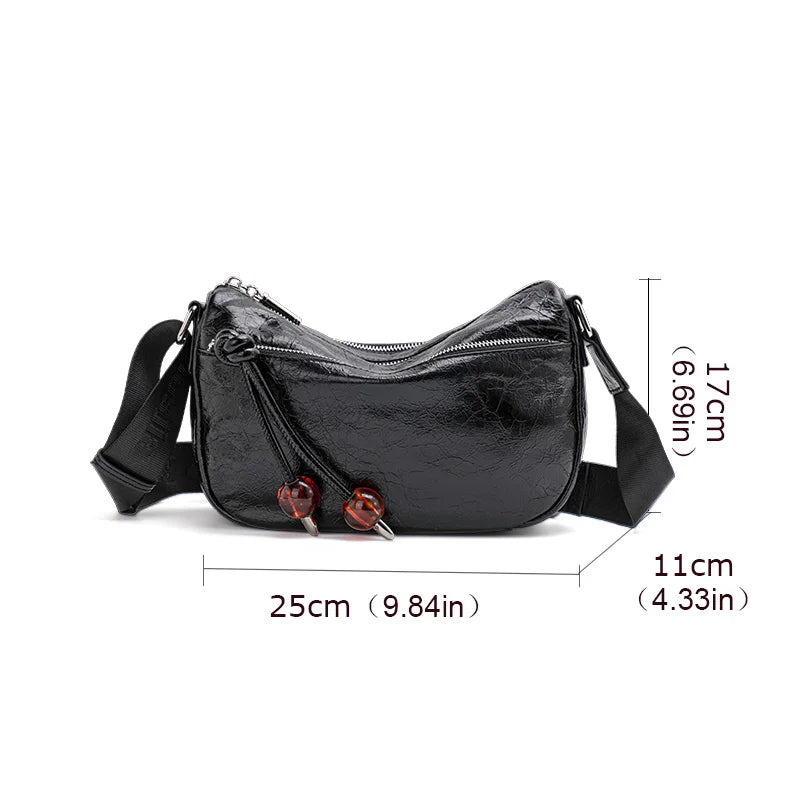 Bolso bandolera de piel suave con textura plisada y elegante para mujer