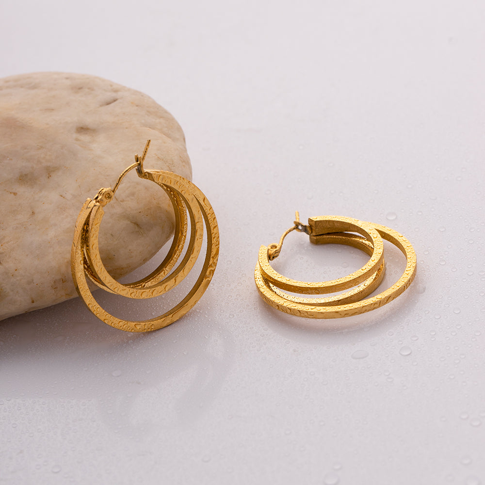 Pendientes de acero inoxidable con doble espiral bañados en oro de 18 quilates
