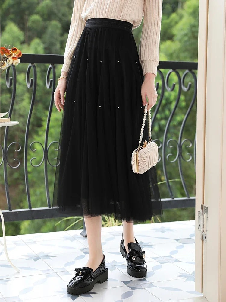 Falda elegante de malla de talle alto en forma de A