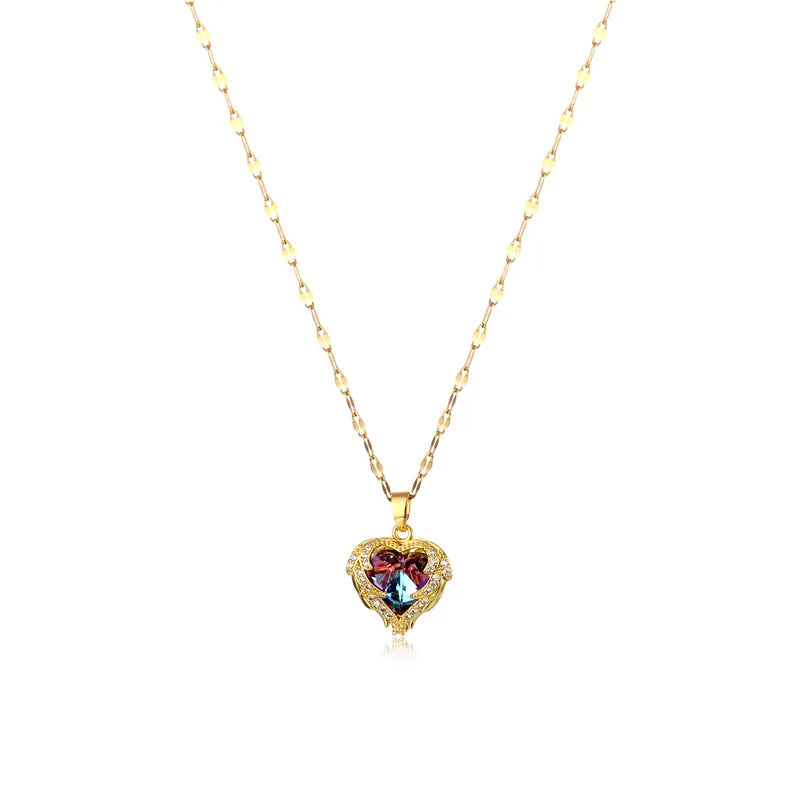 Collar de acero y titanio con corazón de océano dorado