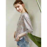 Blusa de ramio con flores de primavera