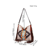 Bolso de hombro grande de lona bohemio chic con detalles de punto y borlas de colores