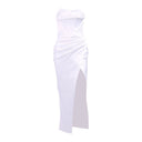 Vestido largo blanco, sin tirantes, sin espalda y con abertura alta