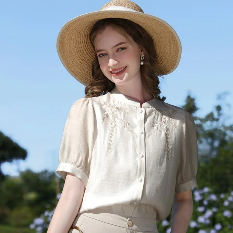 Blusa elegante con mangas abullonadas de estilo chino en mezcla de seda