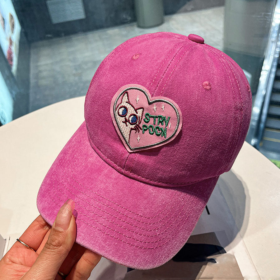 2 gorras de béisbol con dibujos animados de amor