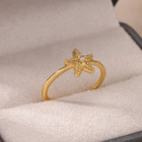 Anillo de estrella de mar con circonitas para mujer