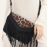 Bolso bandolera bohemio con estampado animal y flecos con borlas