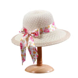 Elegante sombrero para el sol con cinta floral