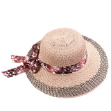 Elegante sombrero para el sol con cinta floral