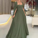 Vestido largo verde asimétrico con hombro descubierto, espalda descubierta y abertura