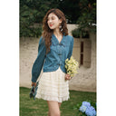 Camisa vaquera informal con cuello vuelto