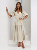 Vestido largo de mujer con escote en V profundo y manga abullonada
