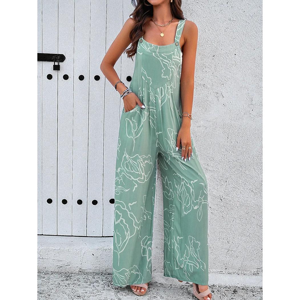 Eleganter Jumpsuit mit weitem Bein, geometrischem Print und Hosenträgern