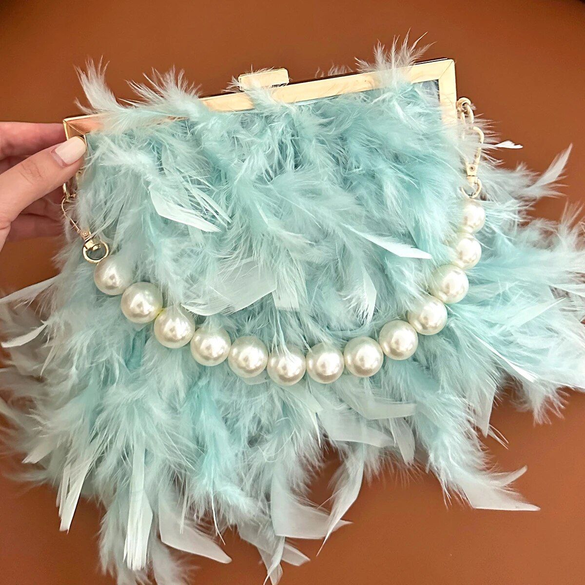 Bolsos de mano de plumas de lujo: Monedero con asa superior de perlas de moda