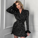Vestido evasé de lunares con lazo