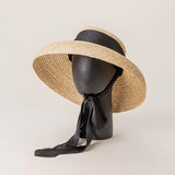 Elegante sombrero de paja de playa de verano de ala ancha