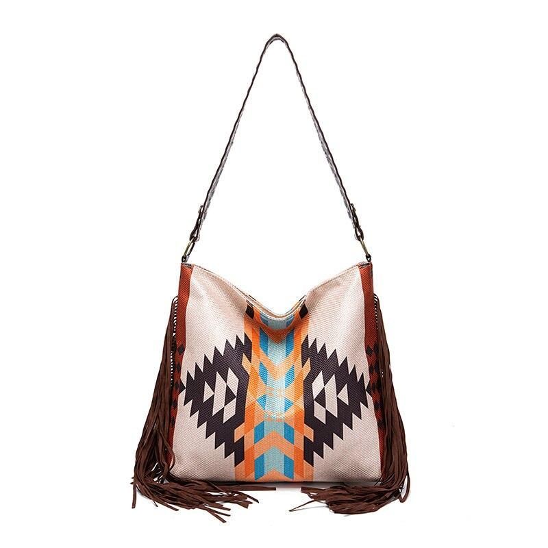 Bolso de hombro grande de lona bohemio chic con detalles de punto y borlas de colores